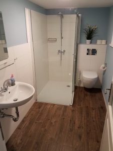 Wohnung Lütt Badezimmer mit Dusche